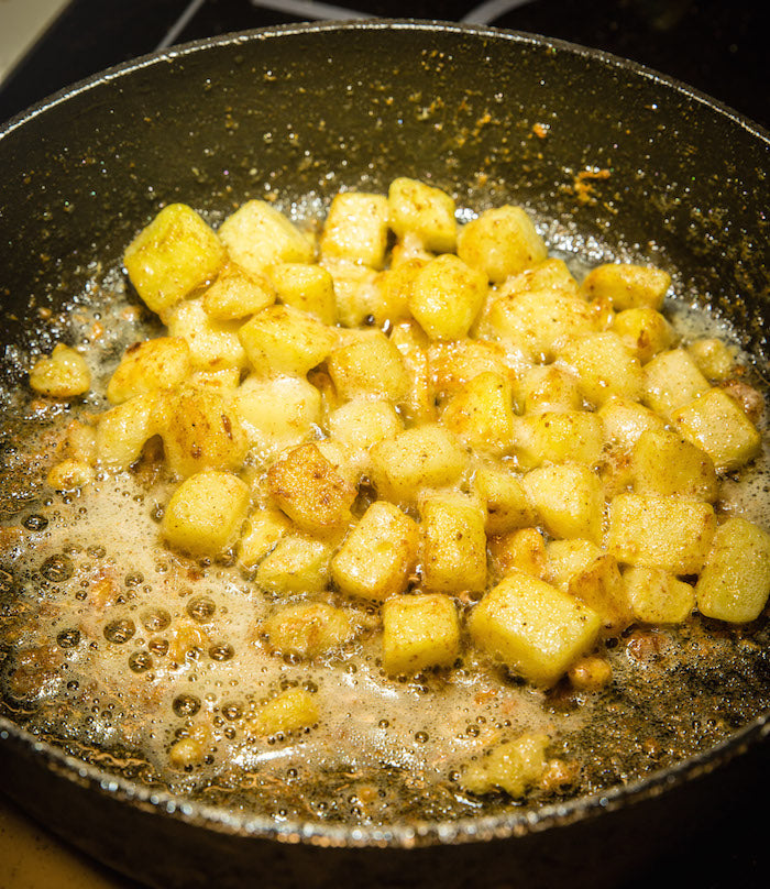 Gebakken spruiten met aardappelen